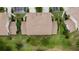 Overhead aerial view of the property showing the roof, landscaping, and surrounding area at 7637 Sweetbay Cir, Bradenton, FL 34203
