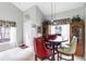 A bright dining area is adjacent to the front door and features stylish furnishings at 7637 Sweetbay Cir, Bradenton, FL 34203