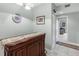Hallway with bar leading to bedrooms at 7637 Sweetbay Cir, Bradenton, FL 34203