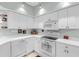 Clean, bright kitchen features plenty of cabinet and counter space at 7637 Sweetbay Cir, Bradenton, FL 34203