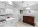 Bright kitchen area with a wine bar and modern appliances at 7637 Sweetbay Cir, Bradenton, FL 34203