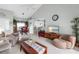 Cozy living room with comfortable furniture and view into kitchen area at 7637 Sweetbay Cir, Bradenton, FL 34203