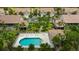 Community pool and surrounding lounge area at 7637 Sweetbay Cir, Bradenton, FL 34203