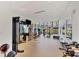 Well-equipped gym featuring machines, free weights, and large windows with a view at 770 Palm Avenue # 903, Sarasota, FL 34236