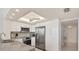 Updated kitchen features modern appliances, ample cabinet space, and contemporary finishes at 770 Palm Avenue # 903, Sarasota, FL 34236