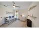 The bedroom has two windows and built-in shelving units at 7984 Glenbrooke Ln, Sarasota, FL 34243