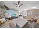 Spacious living room with beach decor, vaulted ceiling and stylish furnishings at 7984 Glenbrooke Ln, Sarasota, FL 34243