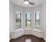 Inviting breakfast nook with built-in seating and bright windows offering a scenic view at 8191 Gabanna Dr, Sarasota, FL 34231