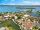 Overhead view showcases premier waterfront homes with private boat docks and winding canals at 868 Siesta Key Cir, Sarasota, FL 34242