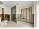 Spacious bathroom featuring a glass enclosed shower and partially finished walls, awaiting custom design at 868 Siesta Key Cir, Sarasota, FL 34242