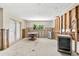 Dining area featuring a wine cooler and french doors, awaiting renovations for a modern gathering space at 868 Siesta Key Cir, Sarasota, FL 34242
