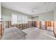 Blank room features shuttered window with wooden framing exposed, ready to be transformed at 868 Siesta Key Cir, Sarasota, FL 34242