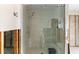 Contemporary bathroom shower boasts a sleek glass enclosure, multiple shower heads, and mosaic tiling at 868 Siesta Key Cir, Sarasota, FL 34242
