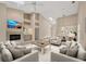 Spacious living room featuring a fireplace, vaulted ceilings, and a bar area at 4517 Las Brisas Ln, Sarasota, FL 34238
