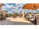 Inviting outdoor patio with ample seating, offering a relaxing atmosphere and scenic views of the community at 4517 Las Brisas Ln, Sarasota, FL 34238