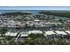 Aerial view of the coastal neighborhood and surrounding waterways at 10423 Waterbird Way # 10423, Bradenton, FL 34209