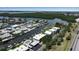 Aerial view of waterfront homes along a canal, showcasing the community's access to waterways at 10423 Waterbird Way # 10423, Bradenton, FL 34209