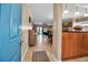 Open foyer with tile floors, and view of the living room and dining area at 10423 Waterbird Way # 10423, Bradenton, FL 34209