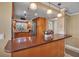 Bright kitchen with stainless steel appliances and breakfast bar at 10423 Waterbird Way # 10423, Bradenton, FL 34209