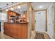 Breakfast bar separates the kitchen area from entry way at 10423 Waterbird Way # 10423, Bradenton, FL 34209