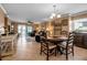 Open-concept living space with dining area and sliding door to the outside at 10423 Waterbird Way # 10423, Bradenton, FL 34209
