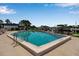 Community pool with convenient access to boat docks for waterfront enjoyment at 10423 Waterbird Way # 10423, Bradenton, FL 34209