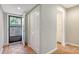 Condo entryway with tile flooring, a closet, and an open view of the unit at 107 Woodland Pl # 107, Osprey, FL 34229
