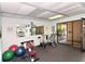 Community gym featuring various machines and equipment, perfect for an active lifestyle at 107 Woodland Pl # 107, Osprey, FL 34229