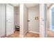 Laundry room with storage and access to another room at 107 Woodland Pl # 107, Osprey, FL 34229