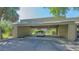 A private covered parking spot next to the condo at 107 Woodland Pl # 107, Osprey, FL 34229