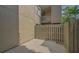 Large back patio with wood plank deck and privacy fence at 107 Woodland Pl # 107, Osprey, FL 34229