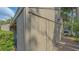 Outside storage closet with adjacent parking space at 107 Woodland Pl # 107, Osprey, FL 34229
