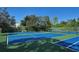 Well-maintained tennis courts offering a great space for recreational activities in a vibrant setting at 107 Woodland Pl # 107, Osprey, FL 34229