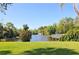Picturesque water view with a fountain and a relaxing deck at 107 Woodland Pl # 107, Osprey, FL 34229