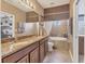 Main bath features double vanity and soaking tub at 11507 84Th Street E Cir # 102, Parrish, FL 34219