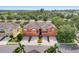 Beautiful two-story townhome features an attached garage, manicured landscaping, and neutral-colored exterior at 11507 84Th Street E Cir # 102, Parrish, FL 34219