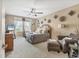 Comfortable main bedroom features a ceiling fan and large windows with natural light at 11507 84Th Street E Cir # 102, Parrish, FL 34219