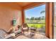 Enjoy the outdoors in this screened-in porch with a peaceful view at 11507 84Th Street E Cir # 102, Parrish, FL 34219