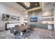 Modern conference room with large table, tv, stylish lighting, and attractive decor at 1155 N Gulfstream Ave # 406, Sarasota, FL 34236