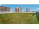 Spacious dog park featuring artificial turf and a pet waste disposal station at 1155 N Gulfstream Ave # 406, Sarasota, FL 34236