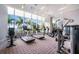 Bright gym offers modern equipment, ample natural light, and scenic views of the surrounding landscape at 1155 N Gulfstream Ave # 406, Sarasota, FL 34236