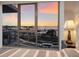 Bedroom with view of boats on the water during sunset at 1155 N Gulfstream Ave # 406, Sarasota, FL 34236
