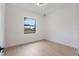 Bright bedroom with large window and light wood flooring at 117 Marker Rd, Rotonda West, FL 33947