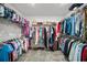 Walk-in closet featuring hanging rods and shelves, perfect for organization at 11783 Moonsail Dr, Parrish, FL 34219