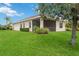 Expansive backyard with well-maintained lawn, ideal for outdoor activities at 12183 Longview Lake Cir, Bradenton, FL 34211