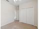 Neutral bedroom with carpet and closet at 12183 Longview Lake Cir, Bradenton, FL 34211