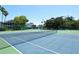 Well-maintained community tennis courts offering residents a great recreational amenity with lush landscaping at 1226 Siesta Bayside Dr # 1226C, Sarasota, FL 34242