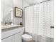 Clean bathroom with a vanity, framed art, and shower/tub combo, a relaxing and functional space at 133 Camillia Ln, Port Charlotte, FL 33954