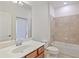 Bathroom featuring a shower-tub combo and a vanity sink with modern fixtures at 148 Wandering Wetlands Cir, Bradenton, FL 34212