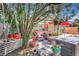 Serene backyard patio adorned with lush foliage and comfortable seating, creating a peaceful retreat at 1489 18Th St, Sarasota, FL 34234